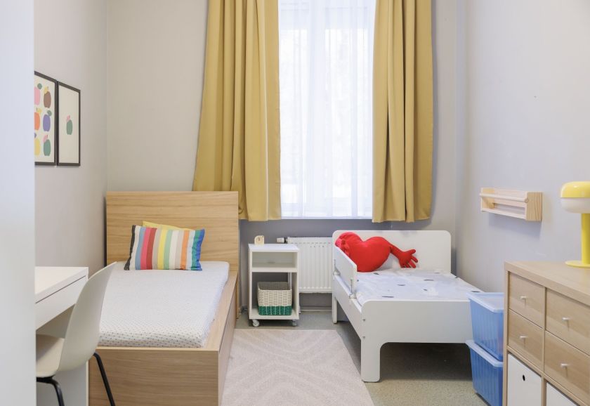 Visas butas vos viename kambaryje: kaip transformuota gyvenamoji erdvė pagalbą teikiančiame centre